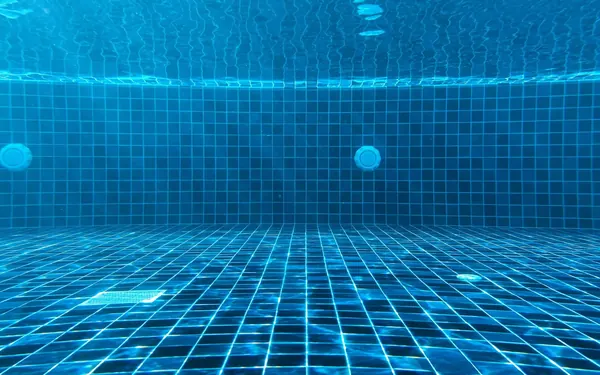 Blue mosaic tiles in a sealed, watertight pool shell